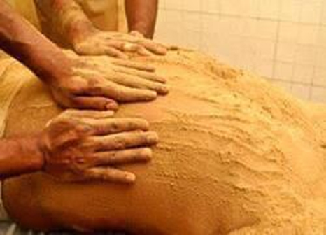 Powder massage treatment at Marsha Ayurvedam